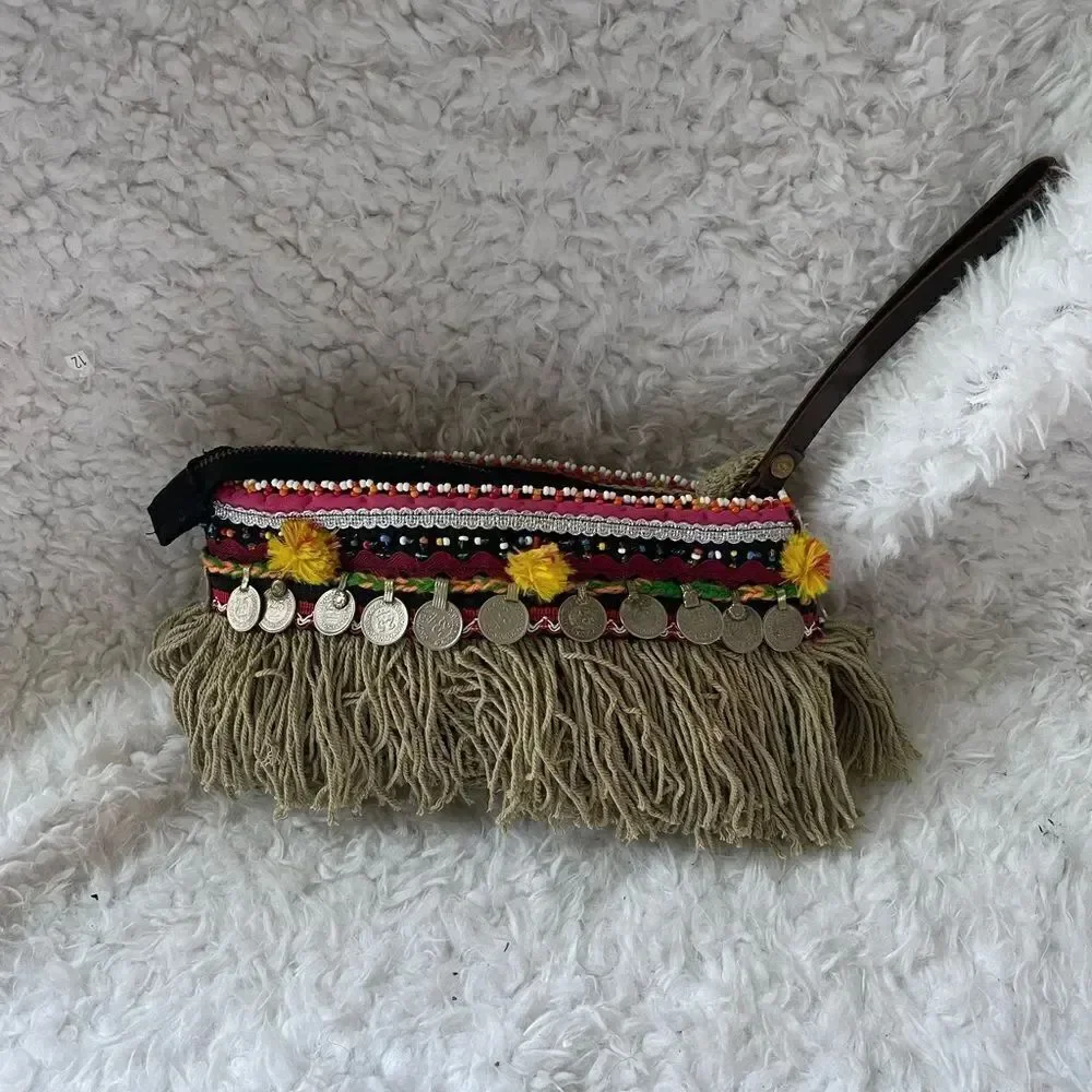 - Elliott Mann Indie multi color clutch with beads and coins accents.